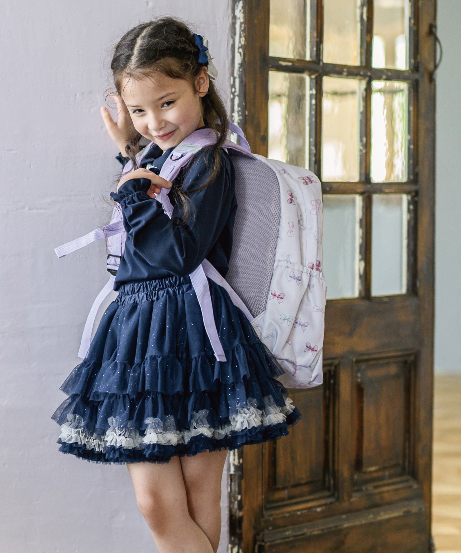 撥水マルチポケットリュック/リボンパレード